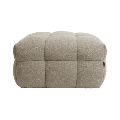 Norah 5 Seater Boucle Sofa Set With Ottoman in Warm Beige, featuring a low, rectangular ottoman with tufted, quilted panels in textured boucle fabric, offering a soft and inviting appearance.