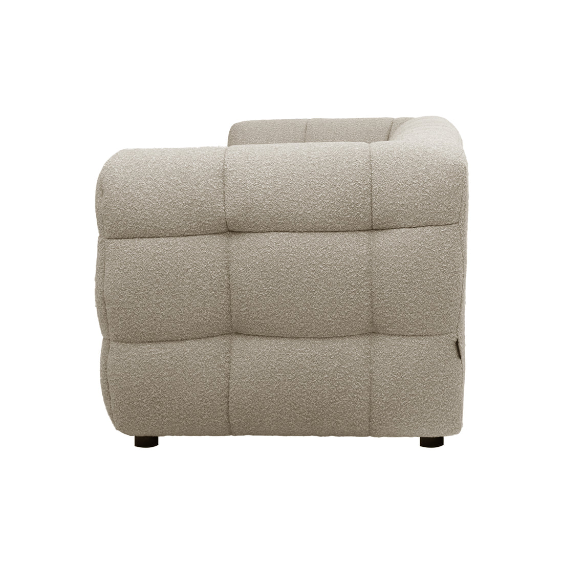 Norah 5 Seater Boucle Sofa Set With Ottoman in Warm Beige featuring a modular corner/arm segment with light-beige boucle fabric, deep grid-pattern tufting, and low black feet for a contemporary look.
