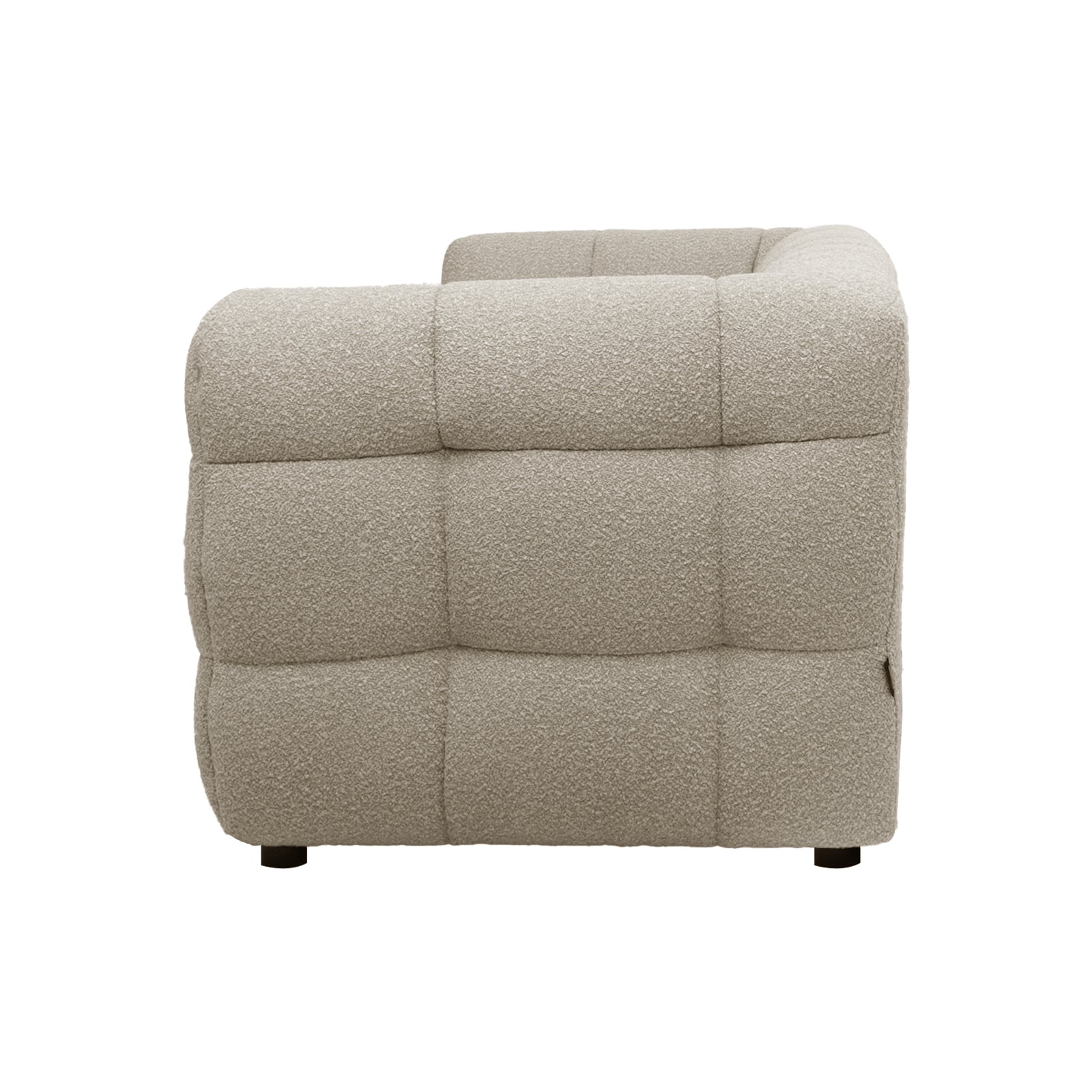 Norah 5 Seater Boucle Sofa Set With Ottoman in Warm Beige featuring a modular corner/arm segment with light-beige boucle fabric, deep grid-pattern tufting, and low black feet for a contemporary look.