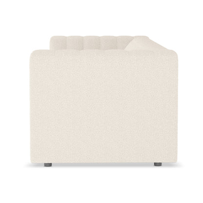 Parisa 3 Seater Tufted Boucle Sofa in Cream White, featuring a modular design with squared-off arms, tufted back cushion, and short, cylindrical feet, upholstered in light-cream boucle fabric.