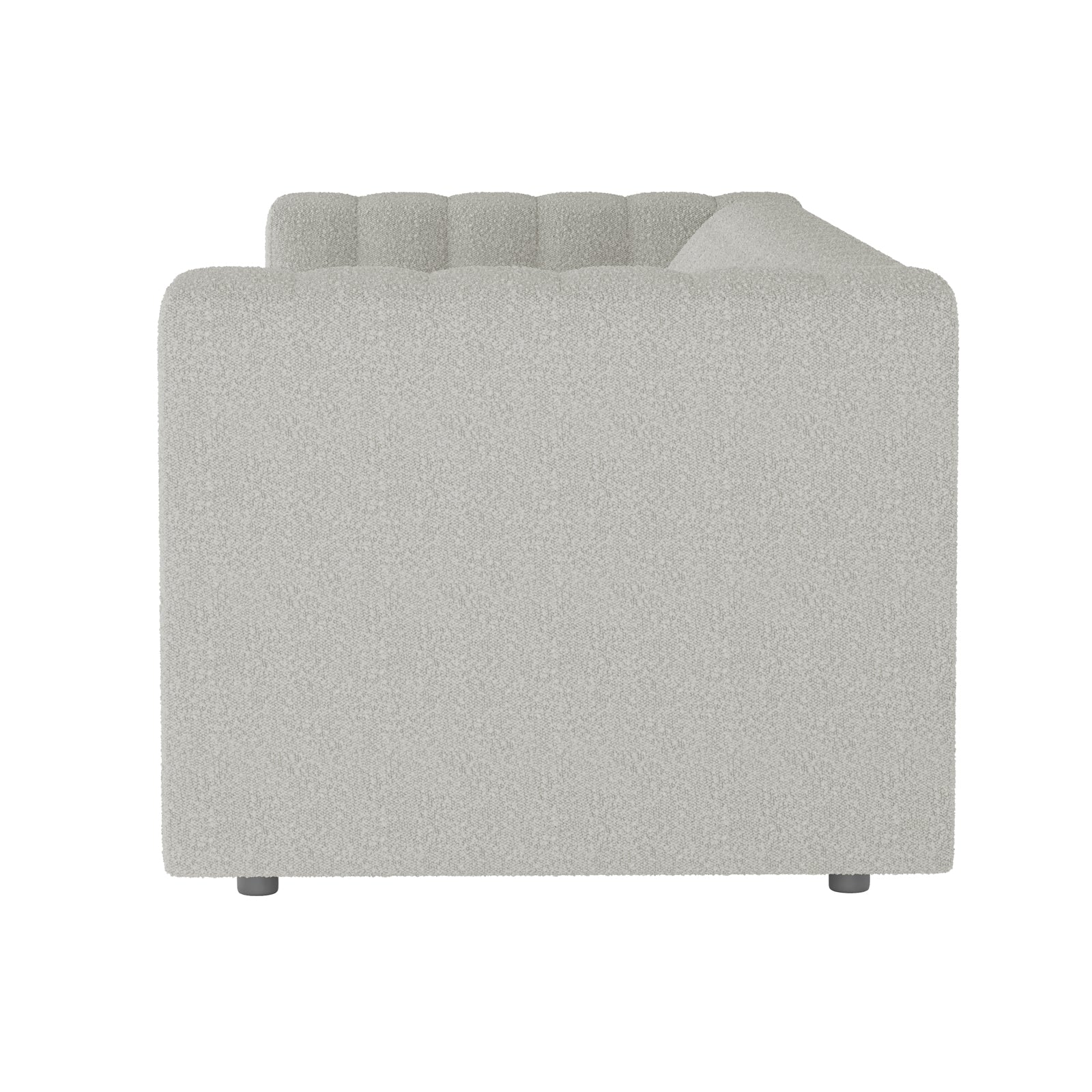 Side view of the Parisa 3 Seater Tufted Boucle Sofa in Light Grey, showcasing its textured fabric, low squared arm and back with channel tufting, and small cylindrical metal legs.