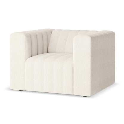 Parisa 1 Seater Tufted Boucle Sofa Cream White, showcasing a close-up of its plush, tufted boucle fabric and supportive armrest, highlighting its modern, chic design ideal for contemporary spaces.