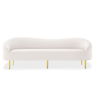Prima 3 Seater Velvet Sofa in Cream with gently curved design, upholstered in soft fabric, featuring five slender brass-finished metal legs, offering a modern and elegant addition to any living room.