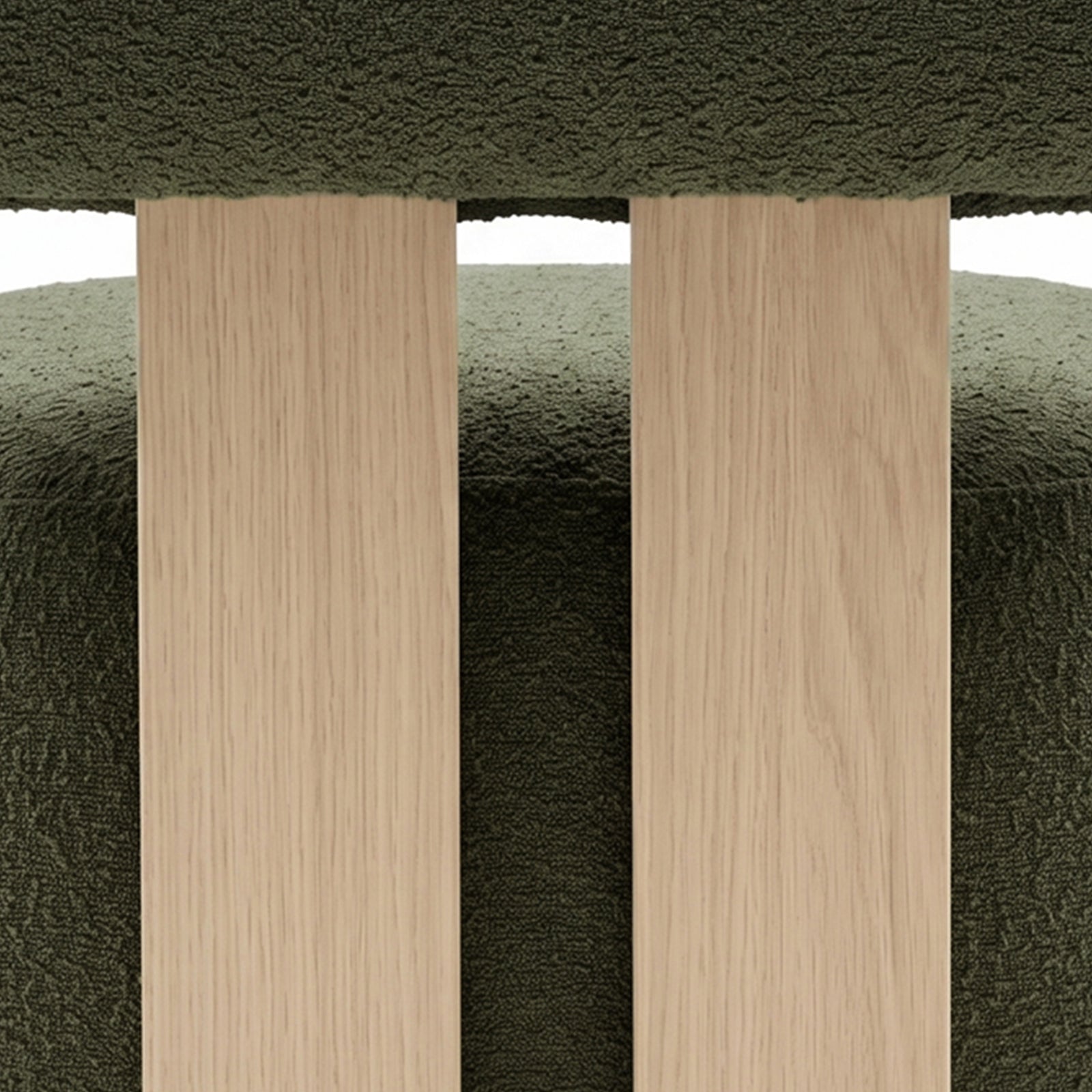 Renley Boucle Armless Accent Chair in Dark Forest Green, showcasing light-oak slats against textured upholstery, highlighting the chair's blend of organic minimalism and robust design.