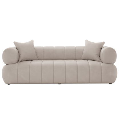 Samira 6 Seater Velvet Sofa Set - Warm Beige, featuring a close-up of a plush white pillow on a luxurious white couch, highlighting the elegant and comfortable design of the sofa set.