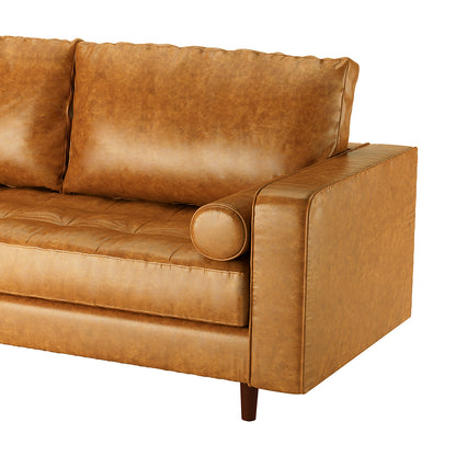 Sollia 3 Seater PU Leather Sofa - Tan Brown, showcasing a close-up of its plush, high-density foam cushions and sleek, sophisticated PU leather upholstery, highlighting its luxurious modern design and craftsmanship.