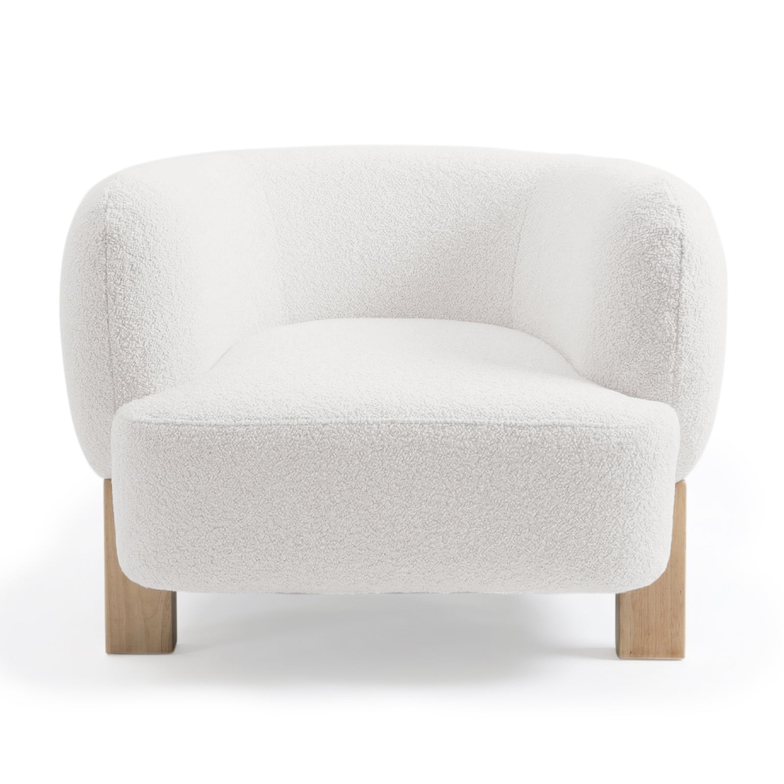 The Sornel Boucle Upholstered Accent Chair in Cream White features a modern silhouette with soft, white boucle fabric and short wooden legs, emphasizing its elegant, curved back and seat design.