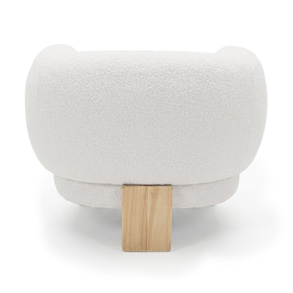 Sornel Boucle Upholstered Accent Chair in Cream White, displaying a low, ottoman-style design with textured boucle fabric and a short solid-wood leg, embodying modern, minimalist elegance.