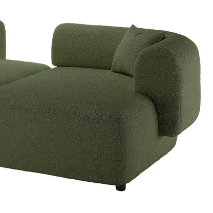 Susie 4-Seater Boucle L-Shaped Sofa in dark green, highlighting its plush upholstery and ergonomic curved backrest, offering a stylish and spacious seating solution for modern living rooms.