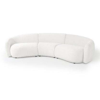 Modern crescent-shaped white sofa on white background
