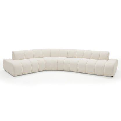 Modern L-shaped beige sectional sofa on white background