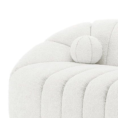 Trina 3 Seater Boucle Sofa with Pillows in Cream White features plush bouclé upholstery, vertical channel tufting, and a matching bolster pillow, combining modern elegance with comfort and durability.