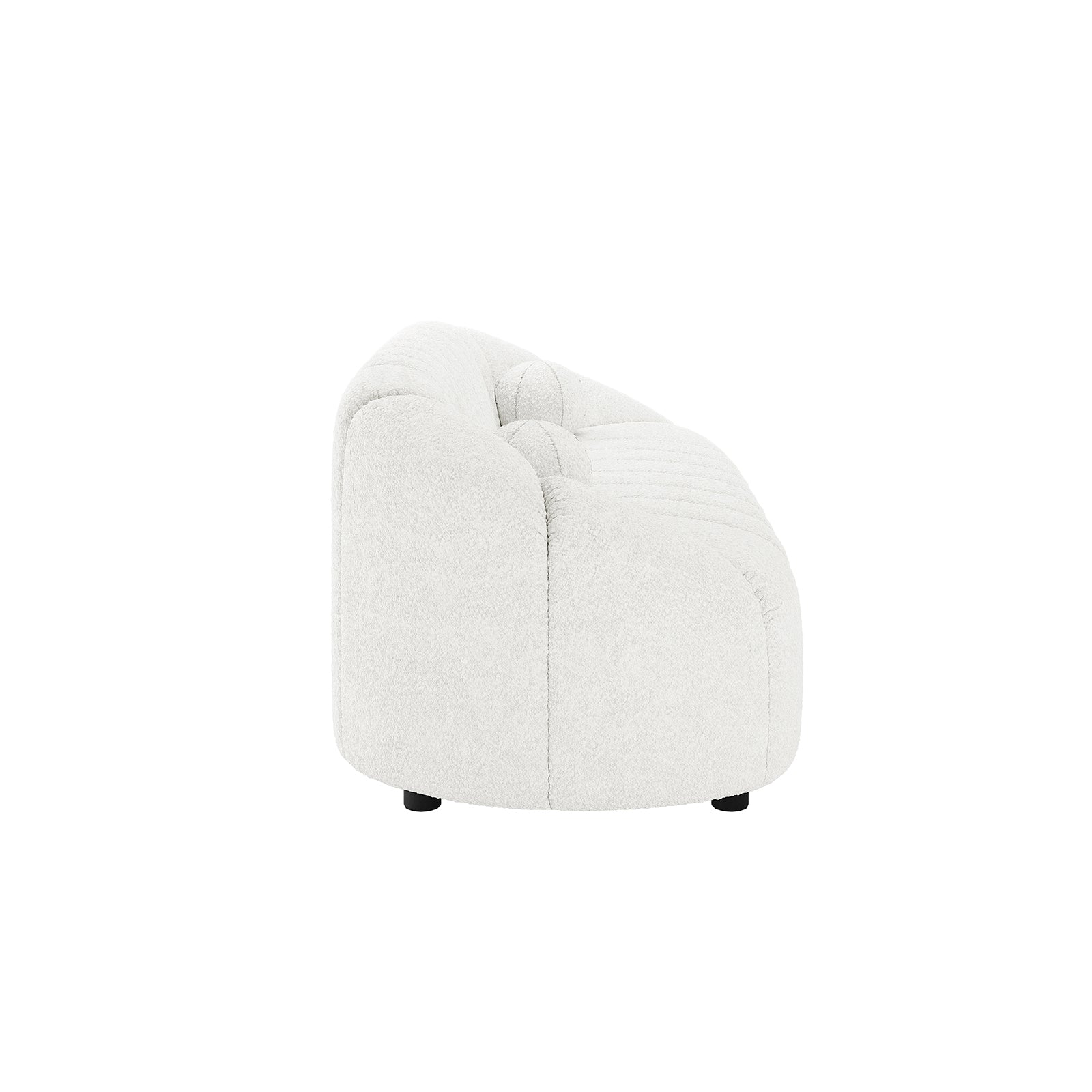 Trina 6 Seater Boucle Sofa Set with Pillows in Cream White featuring a low-profile, tufted, curved lounge chair module in soft white boucle fabric with modest black feet barely visible underneath.