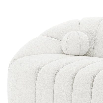 Close-up of the Trina 6 Seater Boucle Sofa Set with Pillows in Cream White, showcasing plush, off-white bouclé upholstery, deep channel tufting, and a matching round bolster pillow for added elegance.