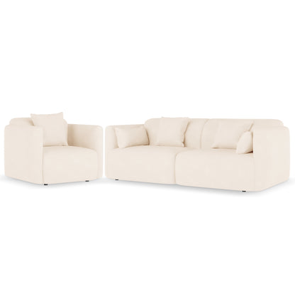 Vestalia 4 Seater Velvet Sofa Set in Cream White, featuring a modular design with a single-seat armchair and a larger two-seat module, both with blocky silhouettes and coordinating throw pillows.