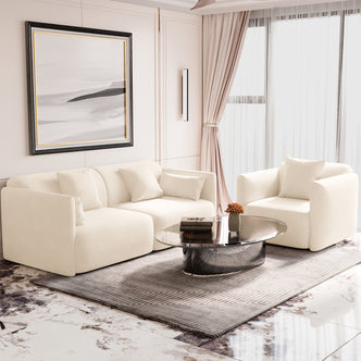 Vestalia 4 Seater Velvet Sofa Set in Cream White, featuring a low-profile, cream-colored sectional with matching throw pillows and a single armchair, complemented by a rounded reflective coffee table.