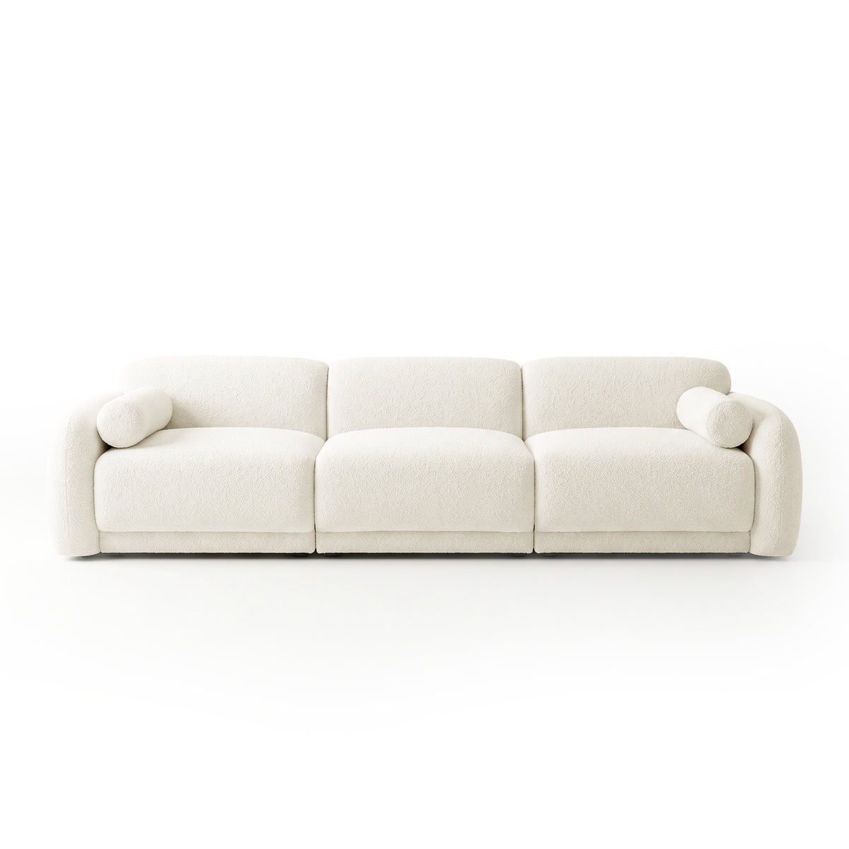 Modern three-seater sofa in off-white with two cylindrical bolster pillows on white background