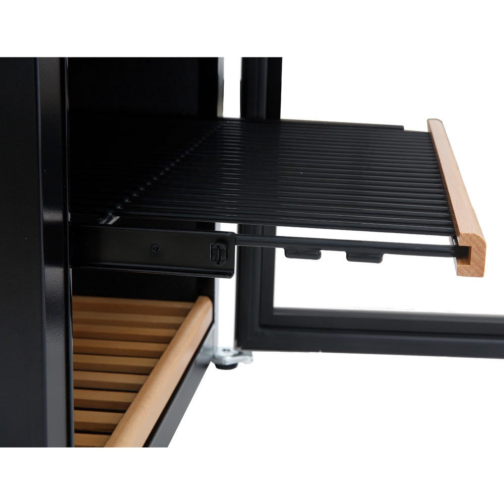 Close-up of the G180D 180 Bottle Dual Zone Wine Fridge in Black, showing a partially extended black metal pull-out shelf with a wooden handle, inside a cabinet with a glass door.