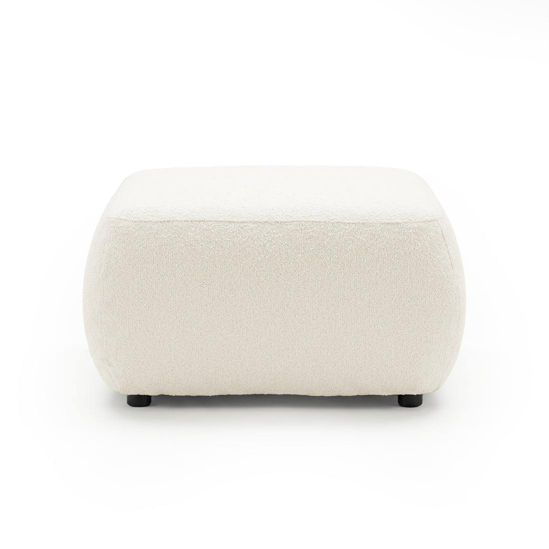 Cream upholstered ottoman on white background
