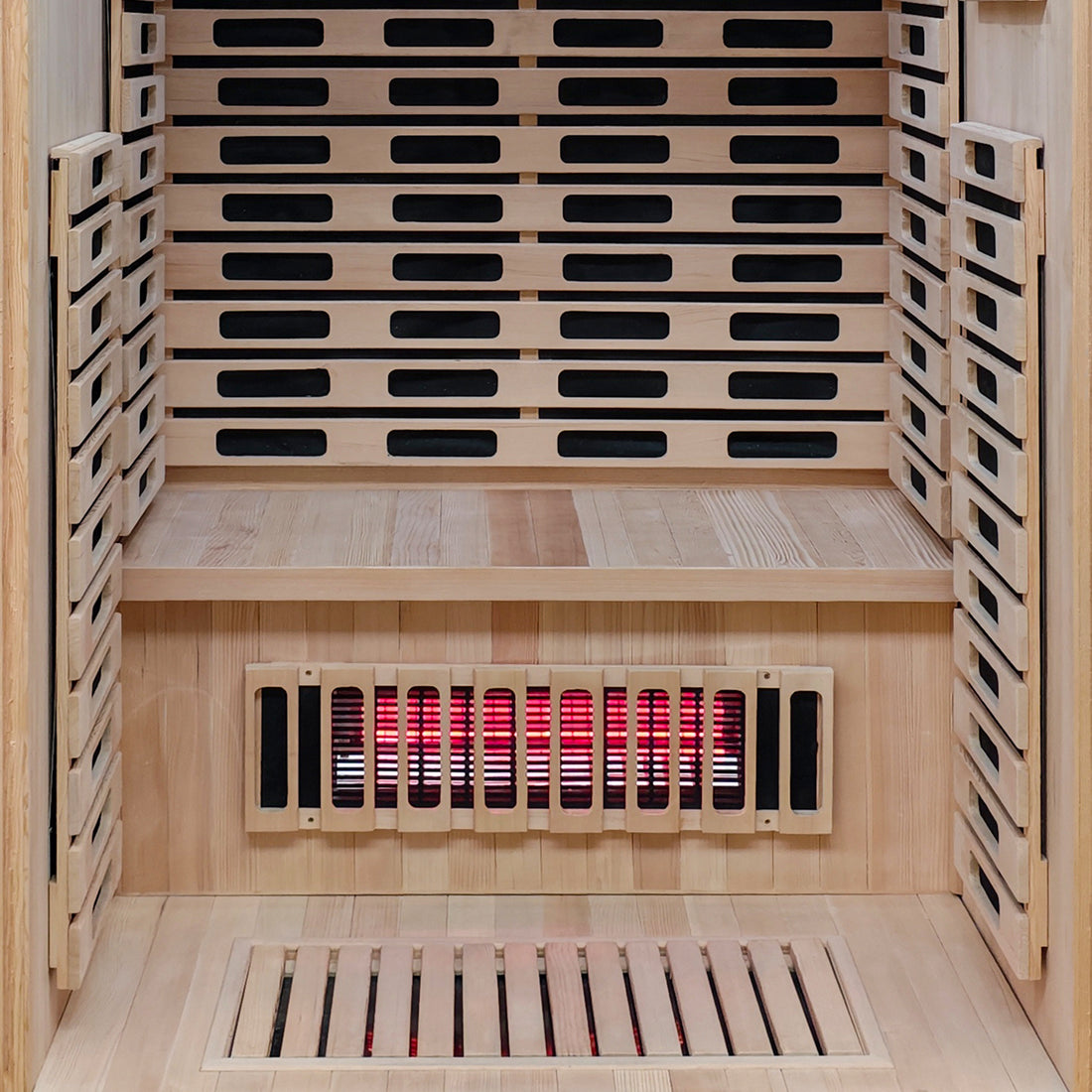 Interior section of a wooden sauna with benches and heating elements.