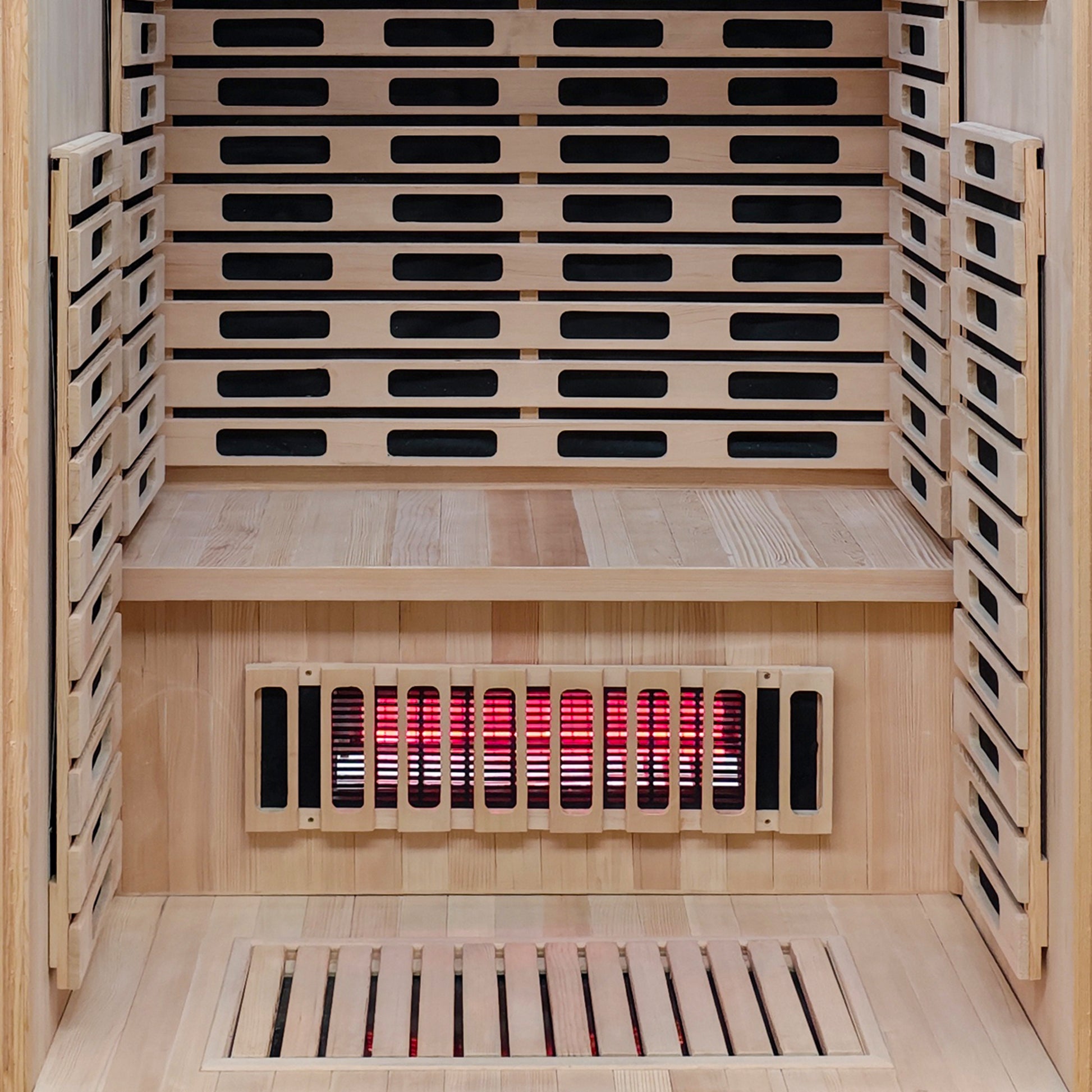 Interior section of a wooden sauna with benches and heating elements.