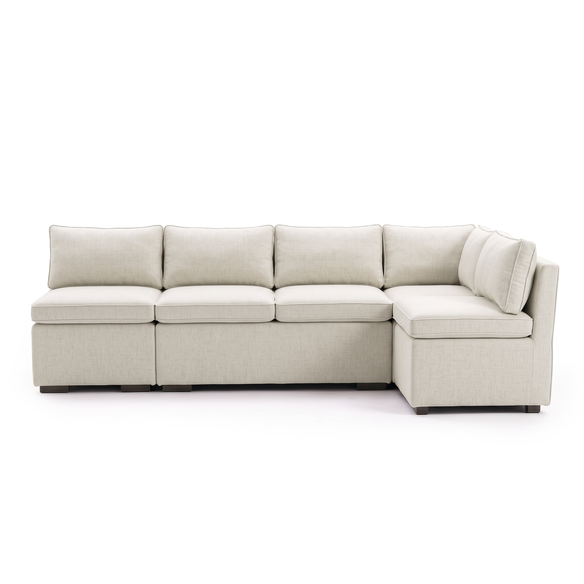 Front view of complete cream L-shaped sectional sofa on white background