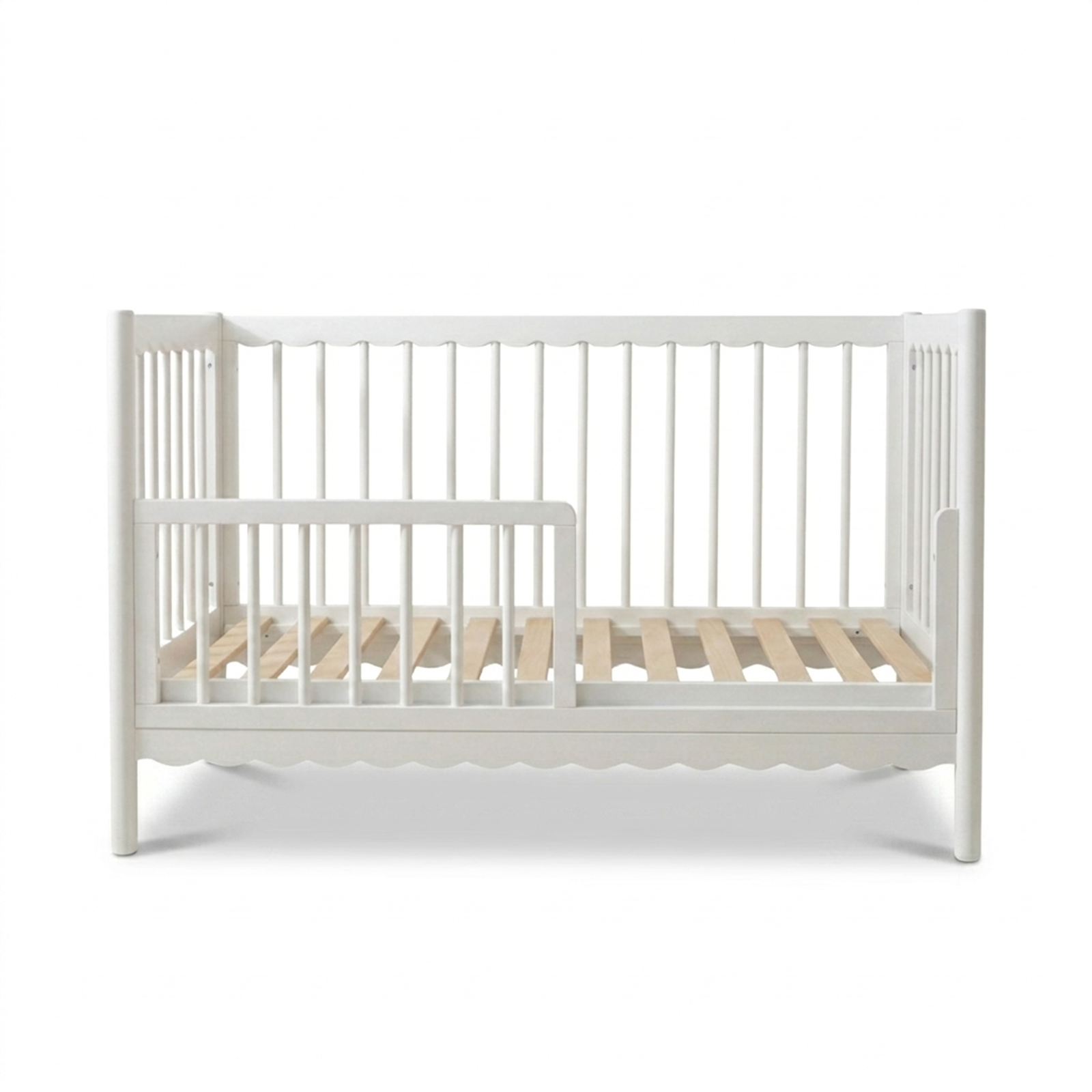 Front view of white crib on a white background