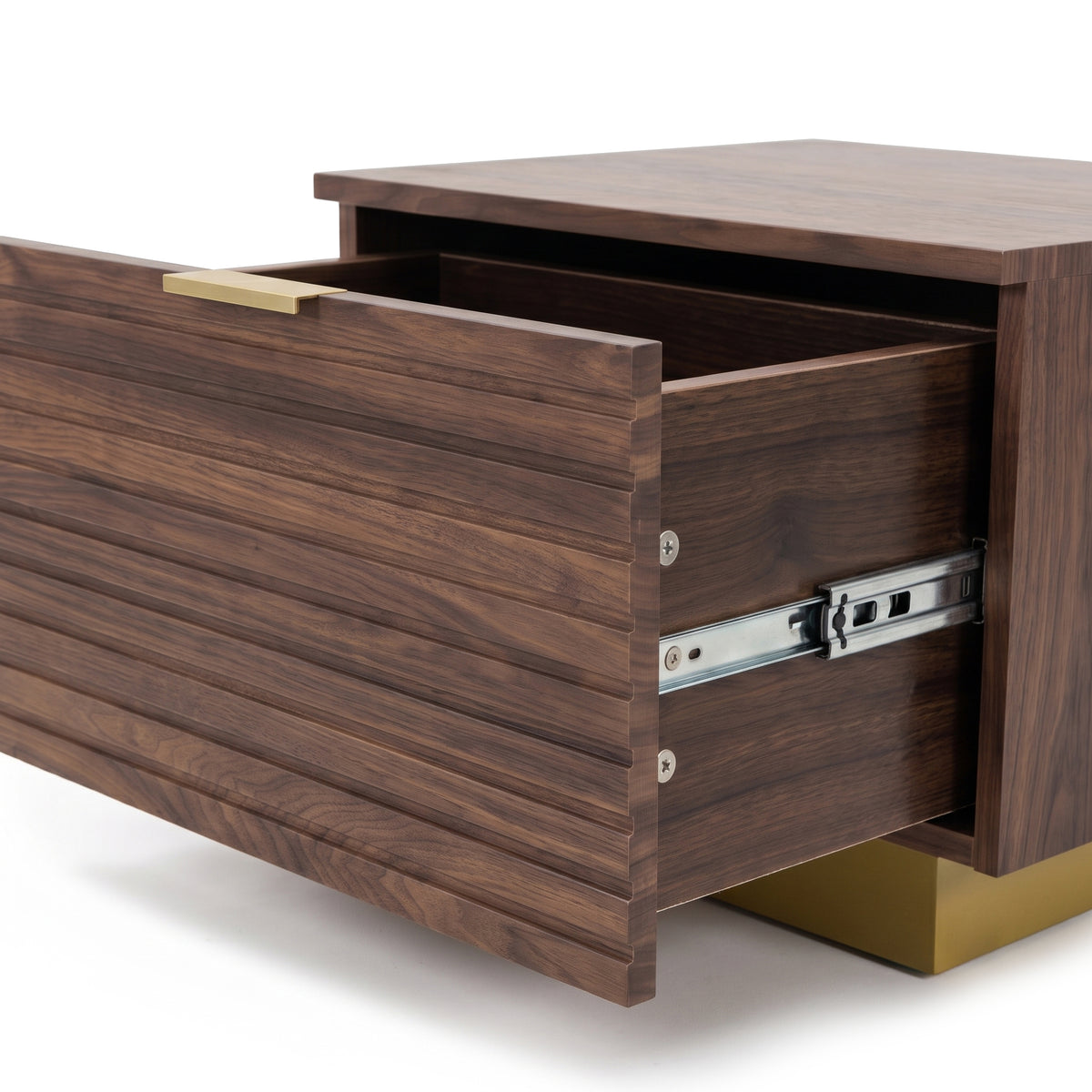 Close-up of open drawer and metal slides on a wooden nightstand