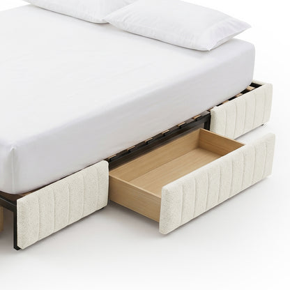 Cropped view of upholstered bed frame with extended storage drawer on white background