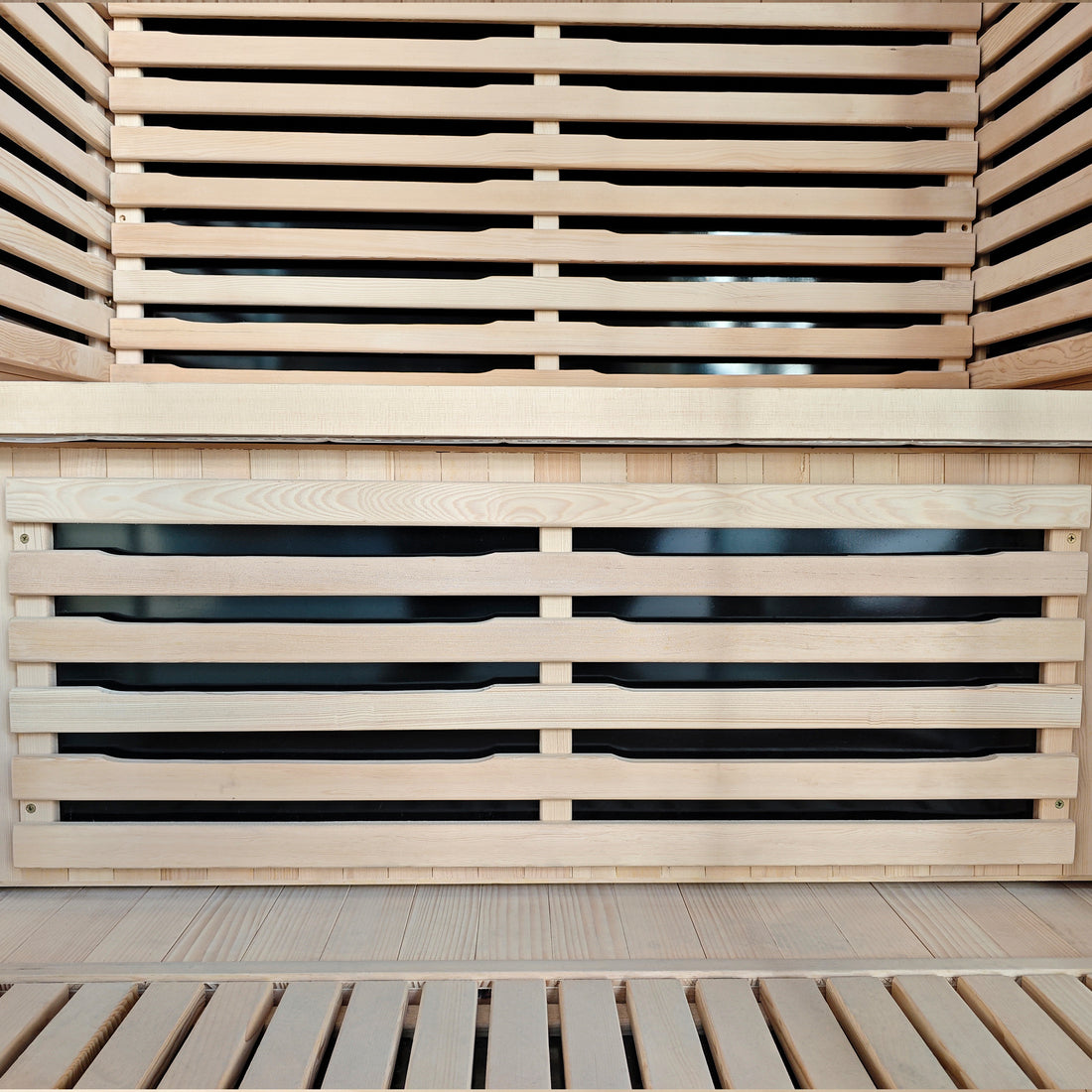 Close-up of wooden sauna bench and slatted interior seating.