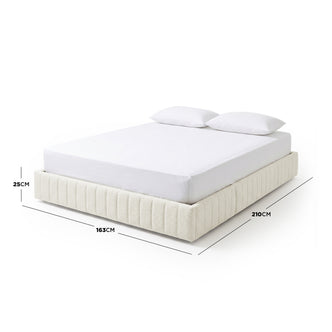 Upholstered bed with mattress showing height, width, and length dimensions