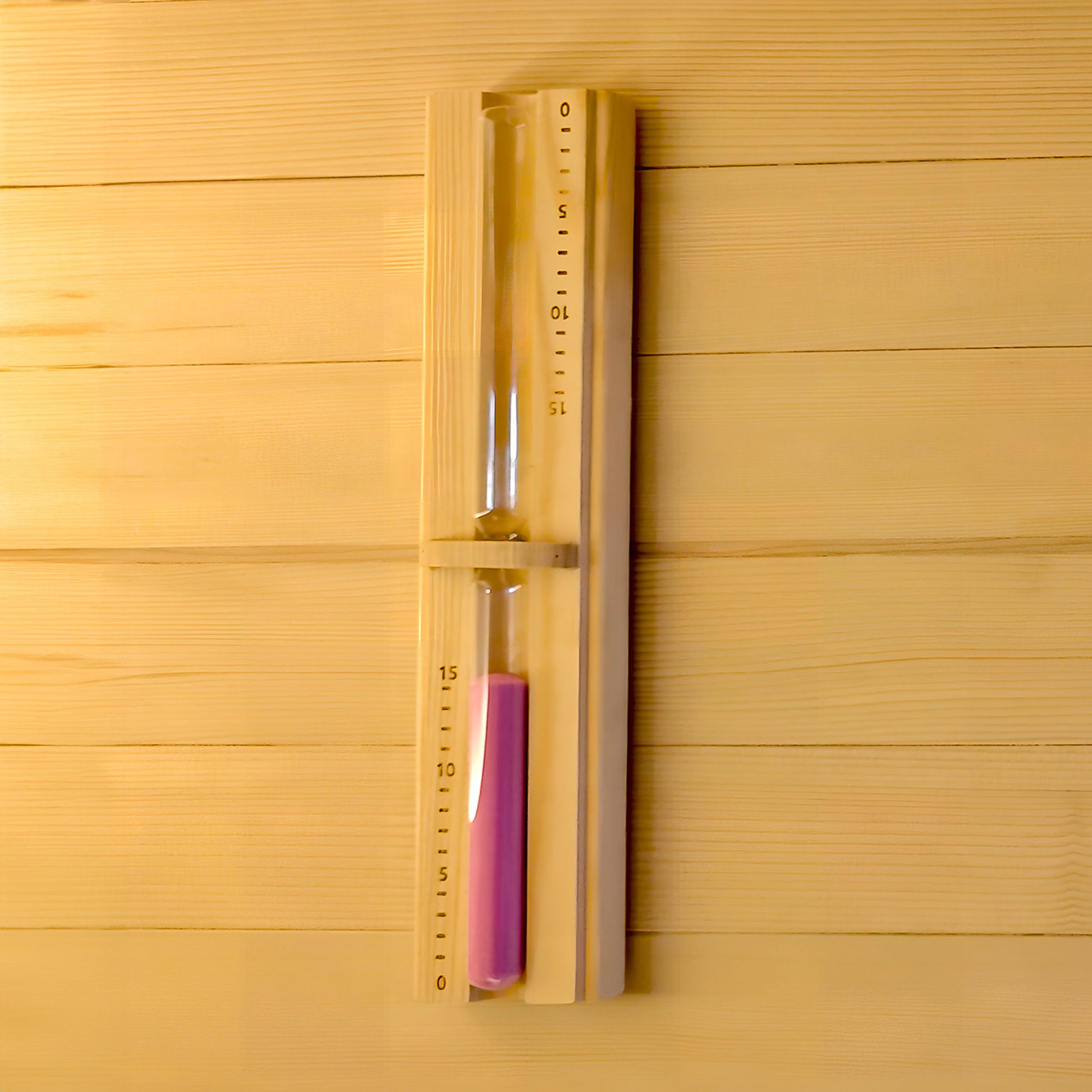 Wooden hourglass timer mounted on a wooden wall with numbered scale markings
