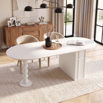 White oval table in a stylish room with decor and natural light