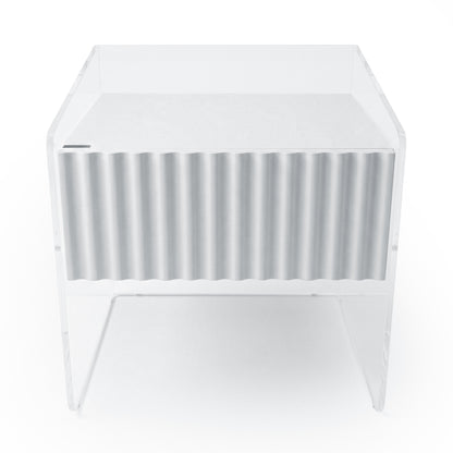 Transparent acrylic side table with ribbed front panel on white background