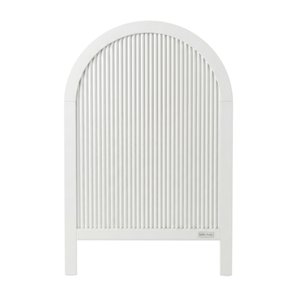 White arched panel with vertical grooves on white background