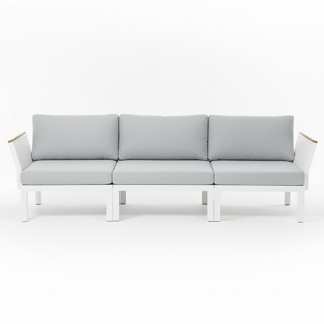 Sierra Outdoor Lounge Set in Grey: Modern three-seat sofa with white metal frame, light gray cushions, angled arms with wood accents, ideal for creating a resort-like ambiance in outdoor spaces.