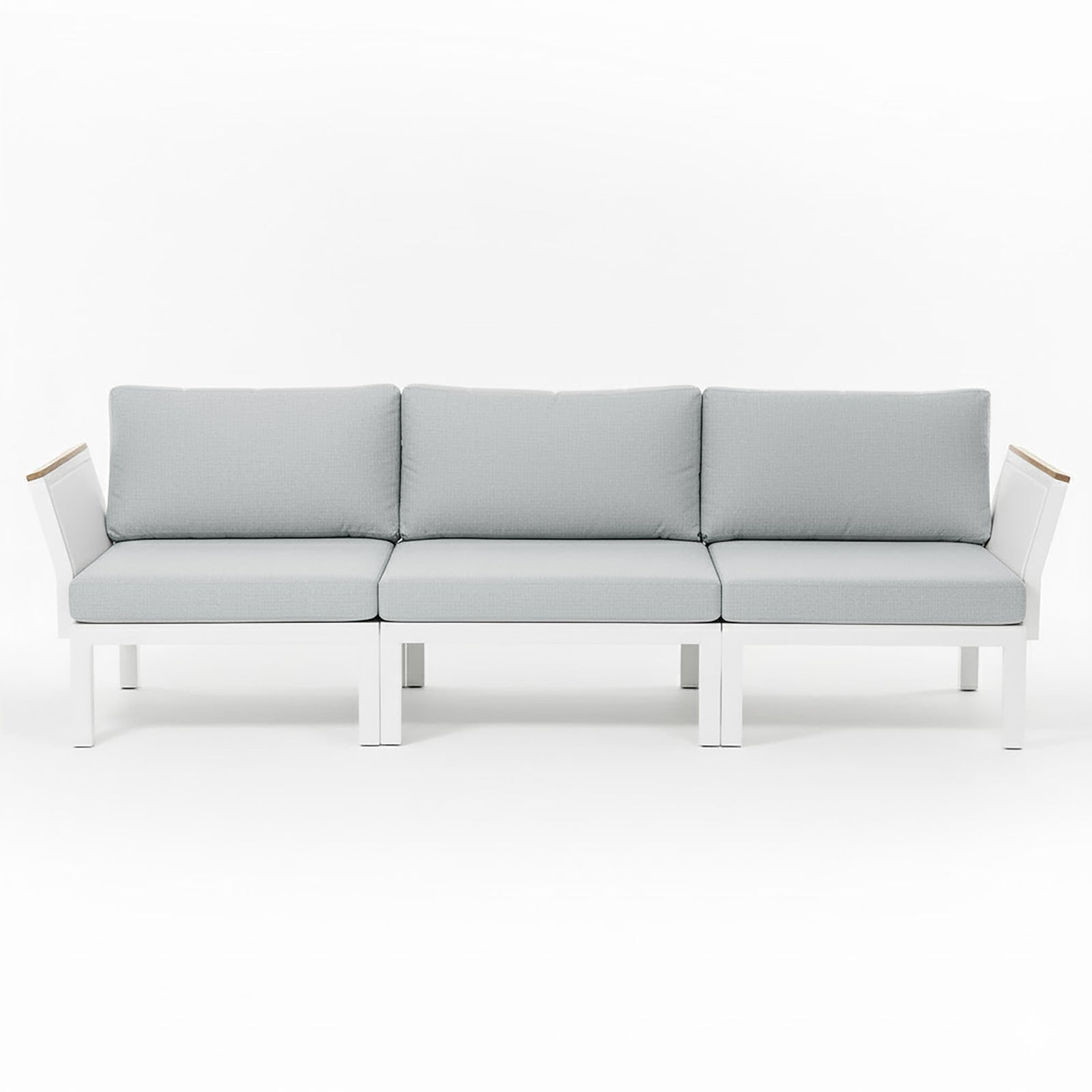 Sierra Outdoor Lounge Set in Grey: Modern three-seat sofa with white metal frame, light gray cushions, angled arms with wood accents, ideal for creating a resort-like ambiance in outdoor spaces.