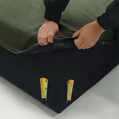Close-up of green furniture corner with removable cover being unzipped