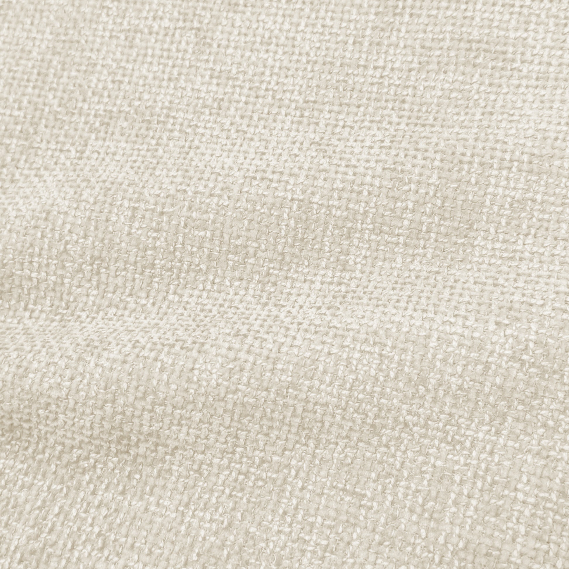 Close-up of light beige woven upholstery fabric texture