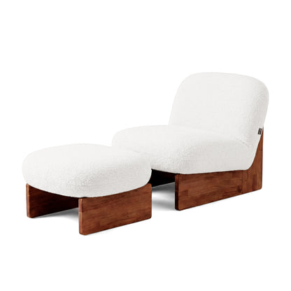 Modern lounge chair and ottoman set on white background, front view.