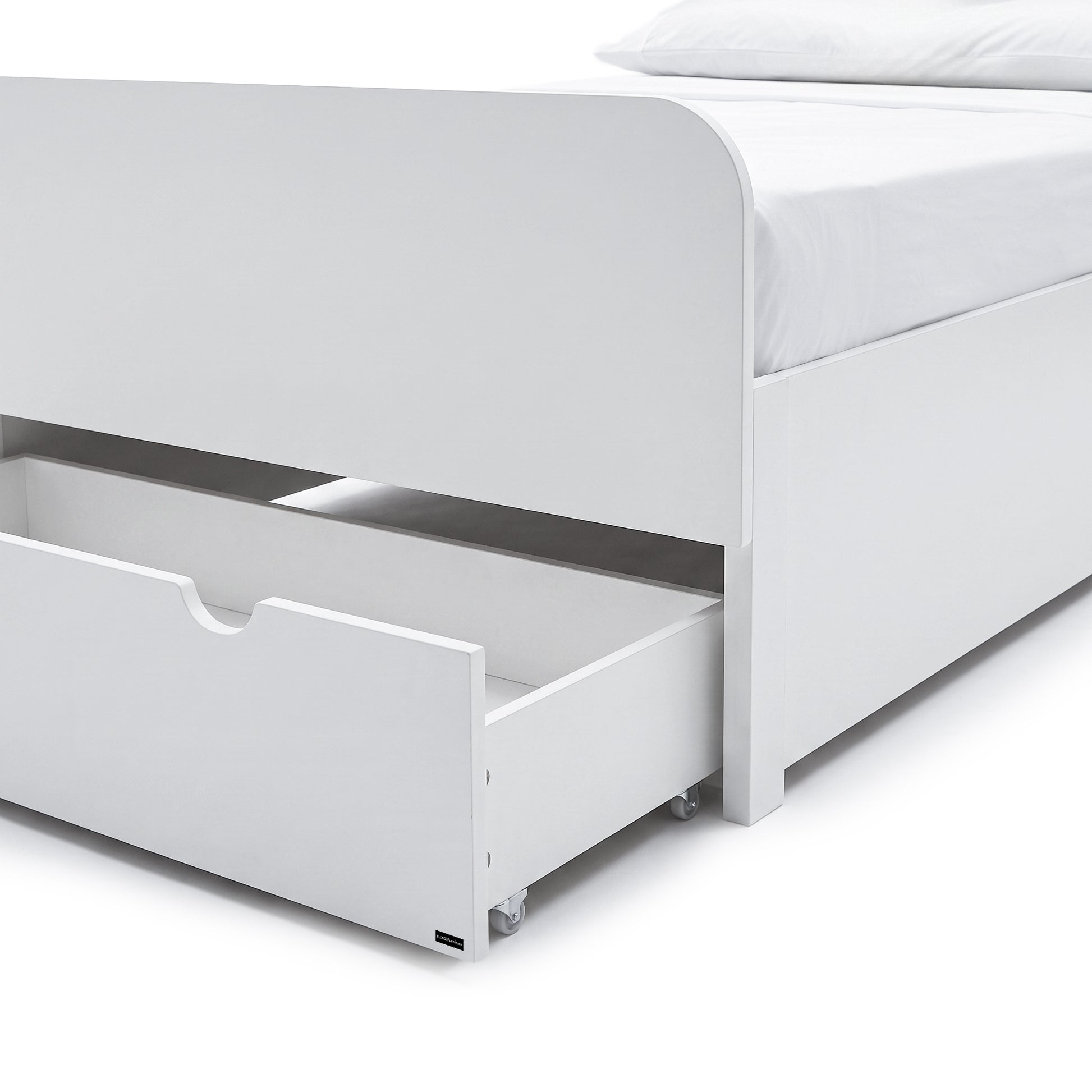 Close-up of the lower section of a white bed frame with an open storage drawer.