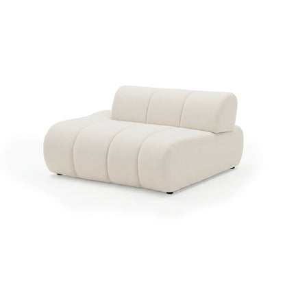 Plush off-white lounge chair on white background
