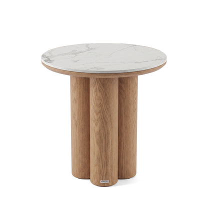 Modern round side table with white marble top and wooden base on white background