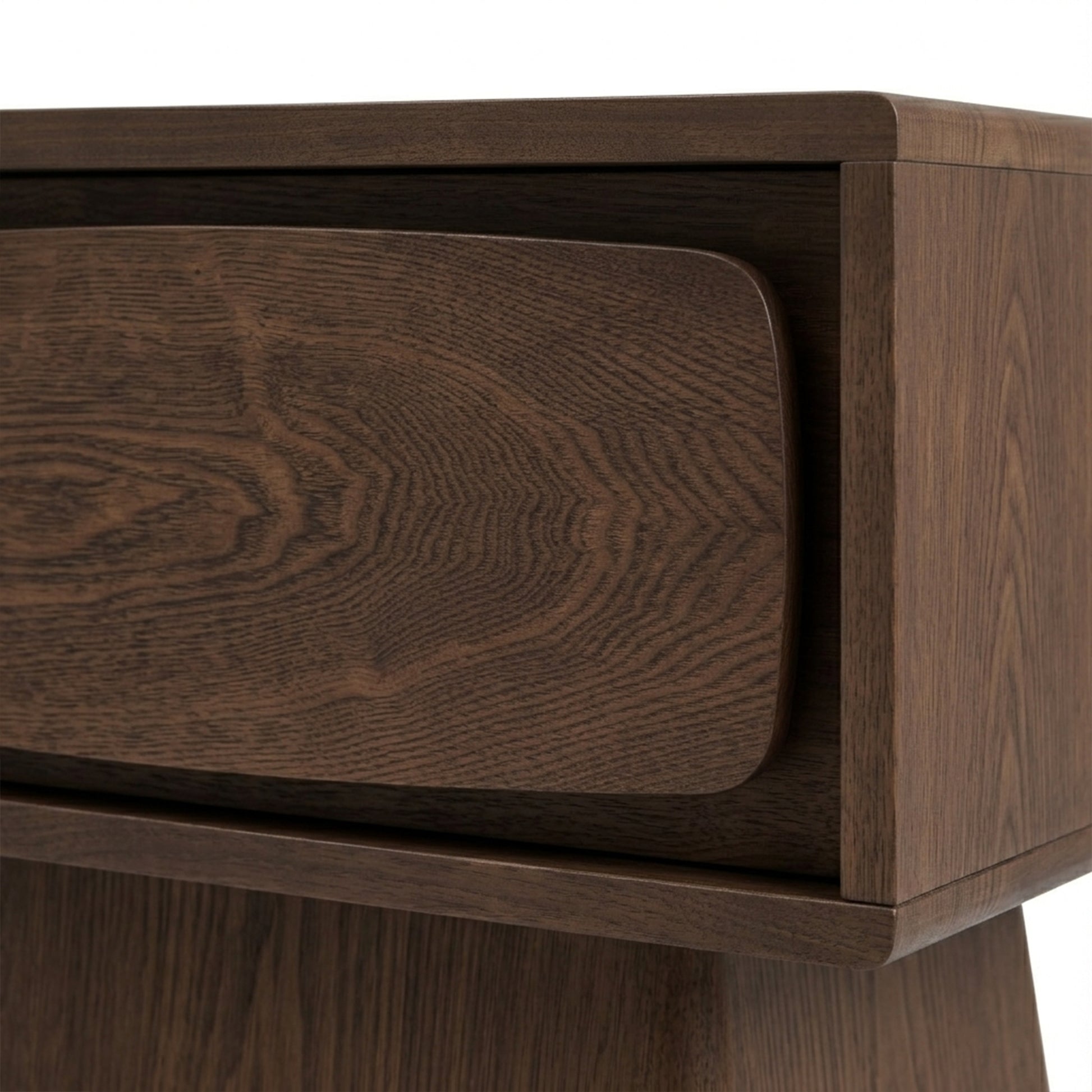 Close-up of the corner and drawer of a wooden nightstand
