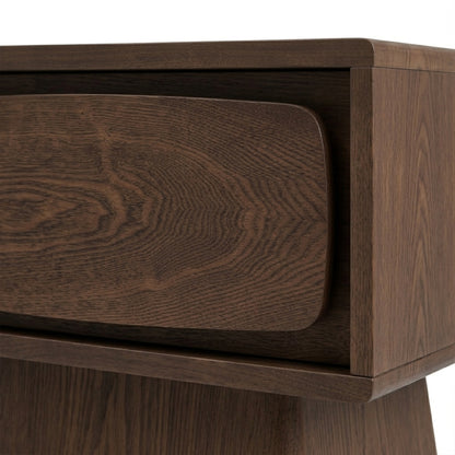 Close-up of the corner and drawer of a wooden nightstand