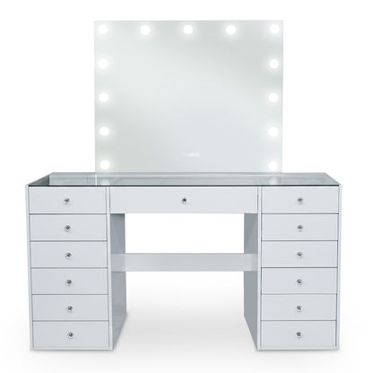 Modern white vanity set with bulbs around mirror on white background