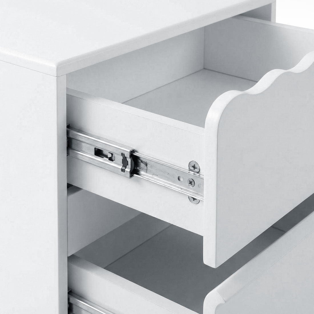 Close-up of drawer sliding mechanism inside white nightstand