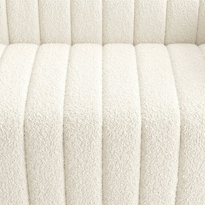 Close-up of cream vertically channeled upholstery texture
