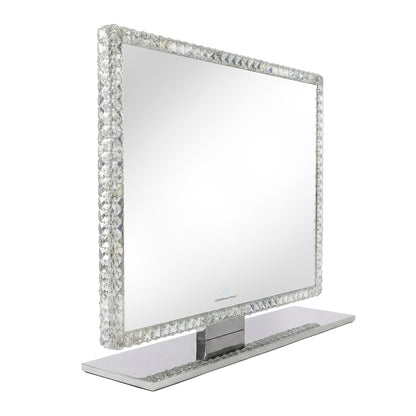 Angled view of rectangular tabletop mirror with crystal border on white background