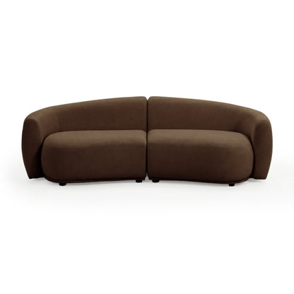 Modern curved brown sectional sofa on white background